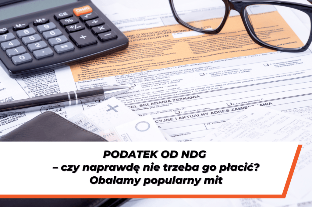 Dokumenty podatkowe, kalkulator i okulary na biurku – grafika ilustrująca temat „Podatek od NDG – czy naprawdę nie trzeba go płacić?”